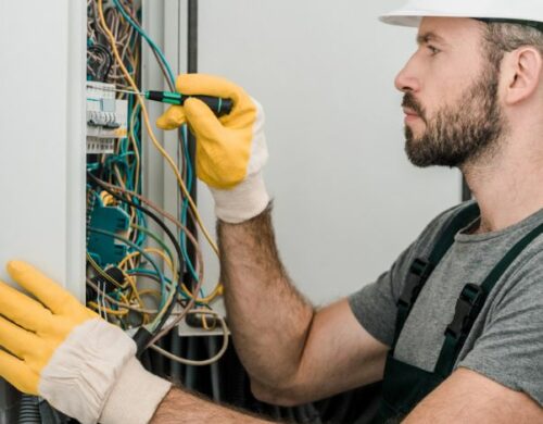 Residential Electrician checking wires in Knightdale, NC