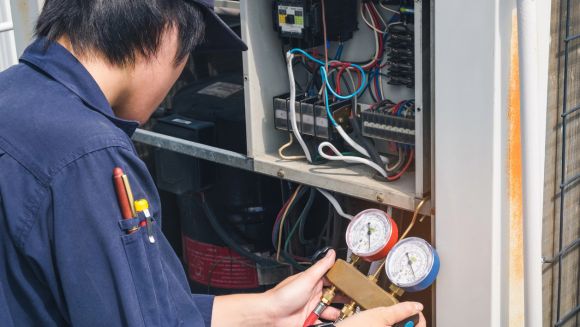 Technician Performing an AC Repair